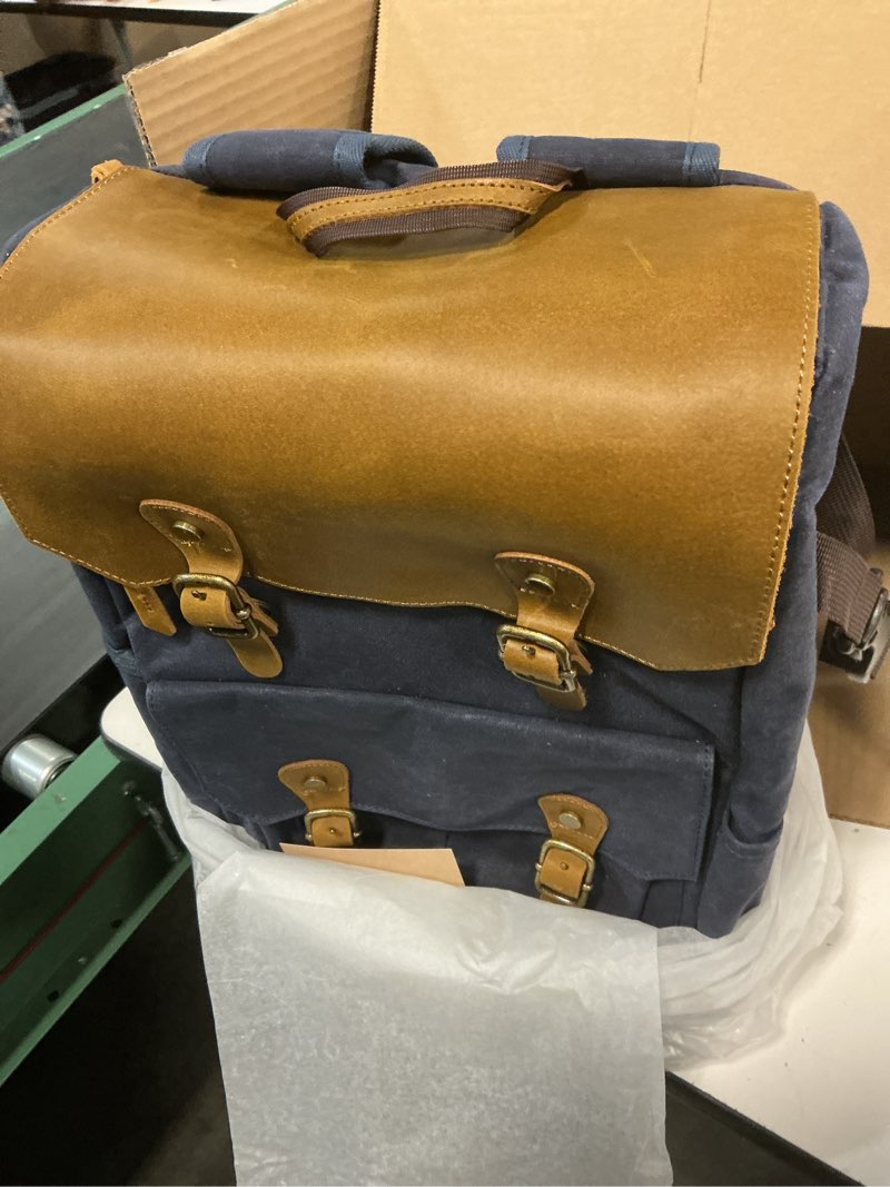 Condition photo showing New/Like New for padwa lifestyle blue camera backpack - waxed memory canvas camera bag, multi dslr slr large camera backpacks for photographers with 16” laptop & lens compartment and tripod holder & weather resistant dark blue waxed memory canvas + crazy horse art cowhide