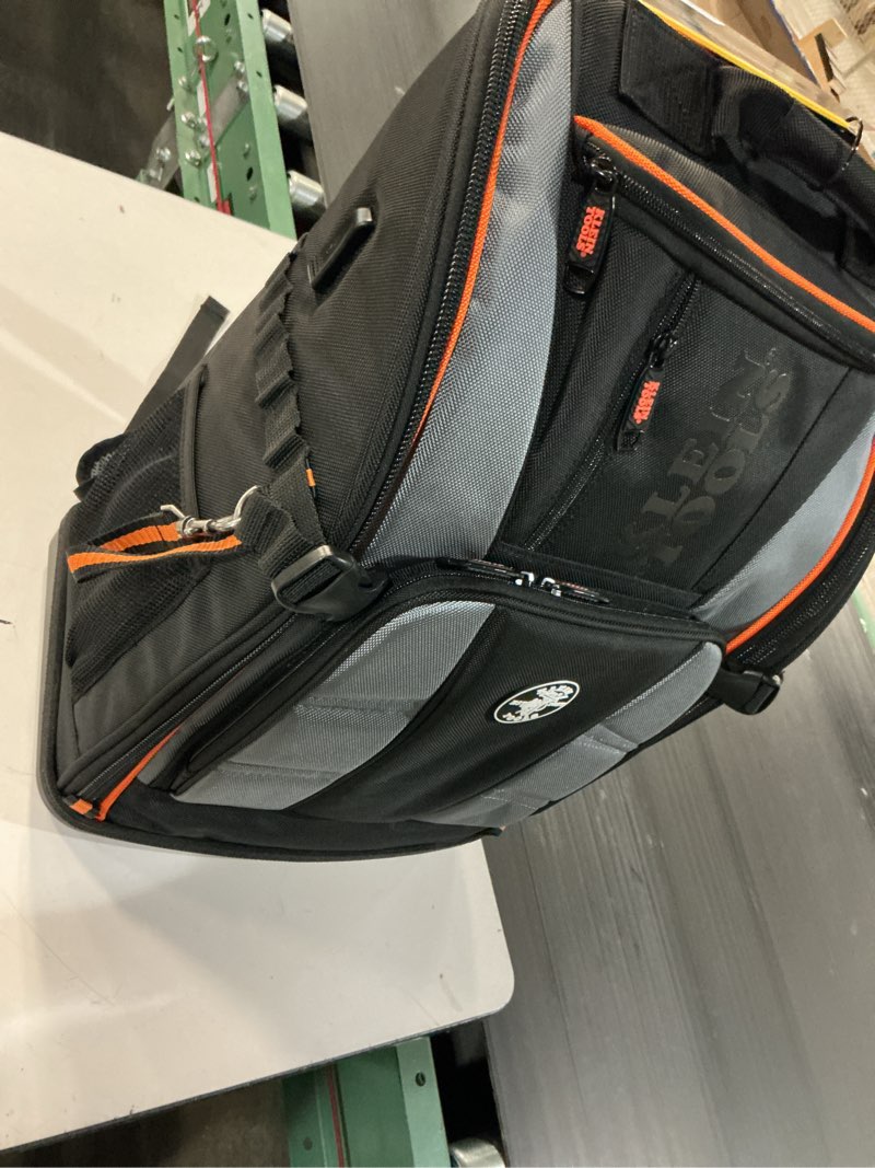 Condition photo showing Good Condition for klein tools 62482 tool backpack, tool-station pro heavy-duty organizer with 27 pockets, large interior, molded bottom, electrician tool bag 27-pocket backpack