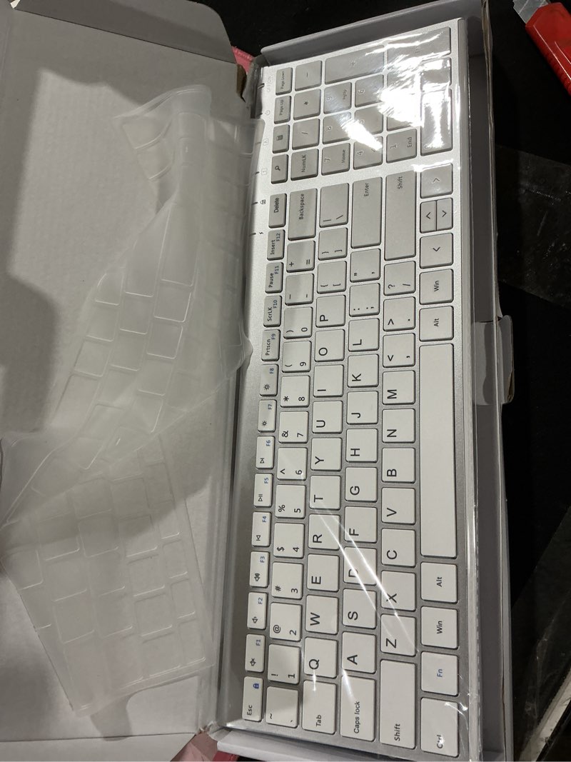 Condition photo showing Good Condition for seenda Rechargeable Wireless Keyboard Mouse, Ultra Thin Low Profile Wireless Keyboard and Mouse with Number Pad, Quiet Portable Combo Compatible for Windows XP/7/8/10/11/11 Pro, Silver White