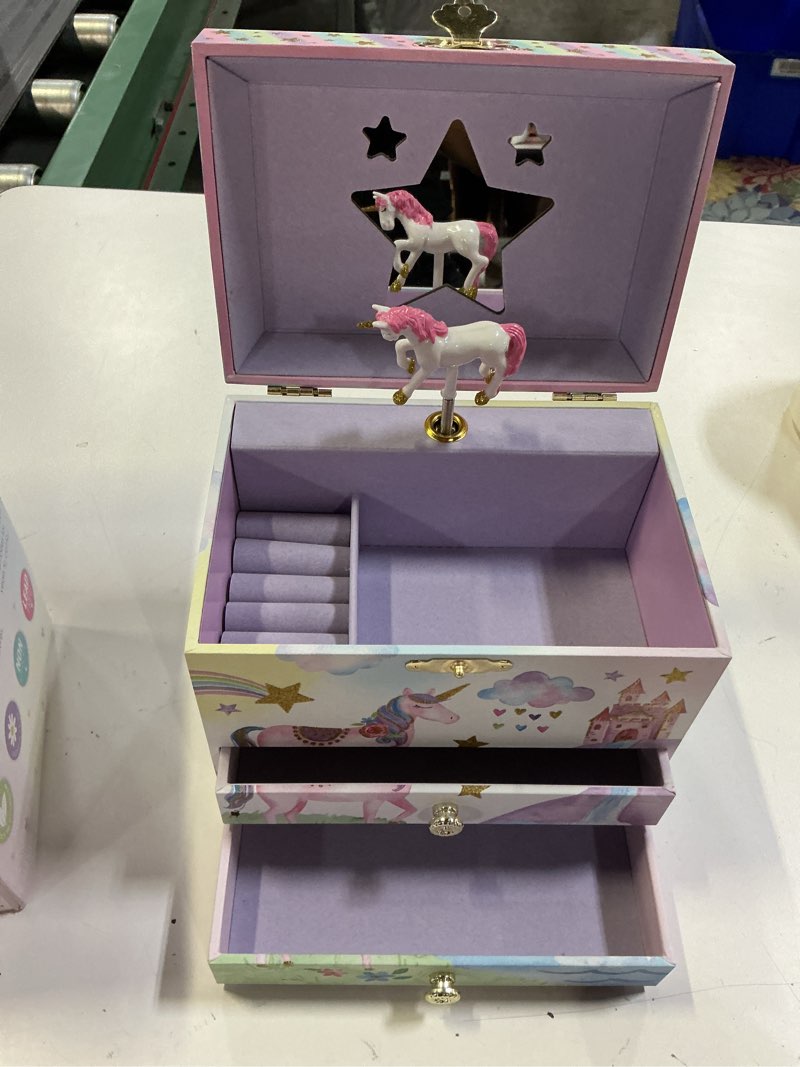 Condition photo showing Good Condition for jewelkeeper enchanting unicorn musical jewelry box for girls - sparkling rainbow design music box with 2 pullout drawers to store earrings, necklace and bracelets - plays the beautiful dreamer tune party unicorn