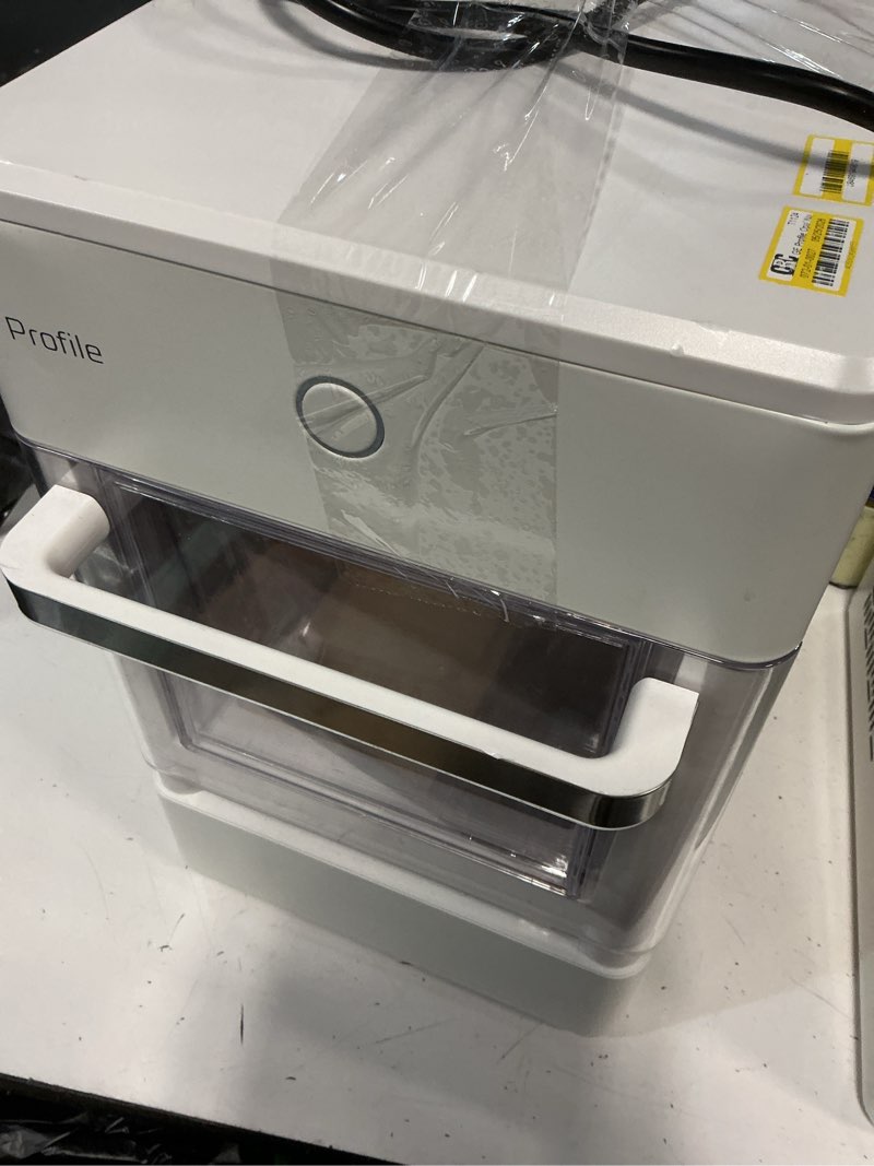 Condition photo showing As Is for ge profile™ opal™ 2.0 ultra nugget ice maker with scale inhibiting filter