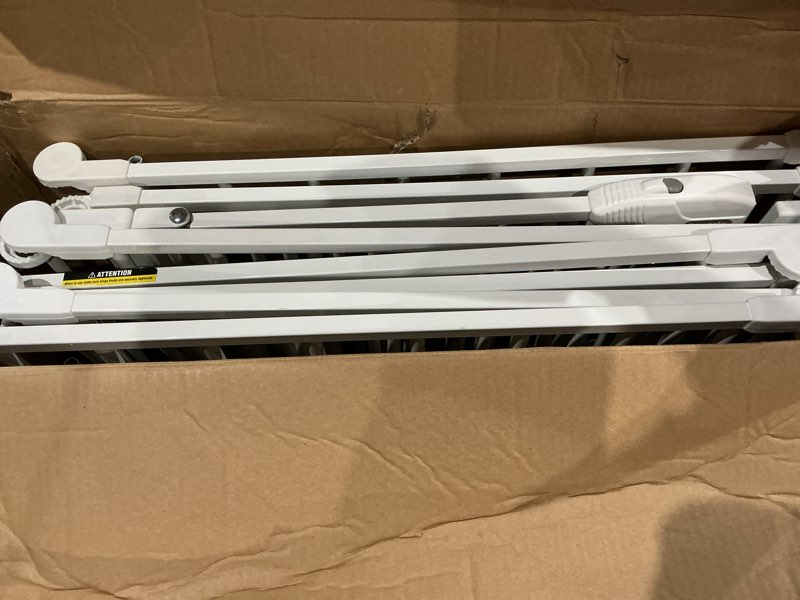 Condition photo showing As Is for regalo safety 192" super wide baby gate & play yard, 2-in-1 convertible extra wide safety barrier, hardware mounted for toddlers & pets, tested & safe for 30 years, american designed & owned, white 50.5-192"w x 28"h white
