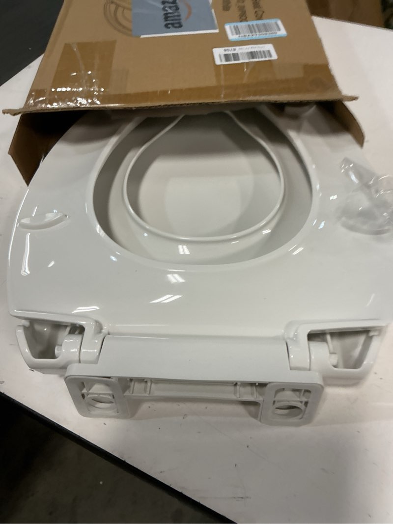 Condition photo showing As Is for Toilet Seat, Elongated Toilet Seat with Toddler Seat Built in, Potty Training Toilet Seat Elongated Fits Both Adult and Child, with Slow Close and Magnets- Elongated