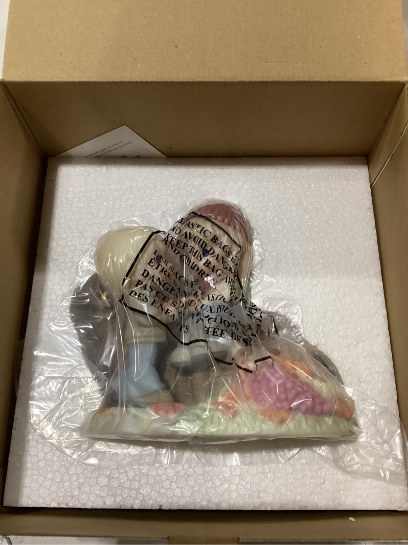 Condition photo showing New/Like New for precious moments may your blessings be bountiful figurine