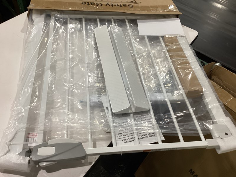 Condition photo showing New/Like New for dearbb triple lock baby gate for stairs doorways and house 31" to 86" extra wide pressure mounted easy walk through auto close safety pet gate white 31.1-48.42"
