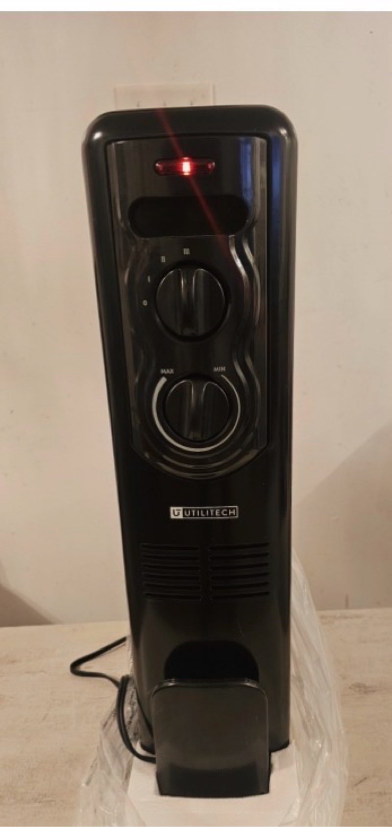 utilitech 1500-watt oil-filled radiator indoor electric space heater 5228419