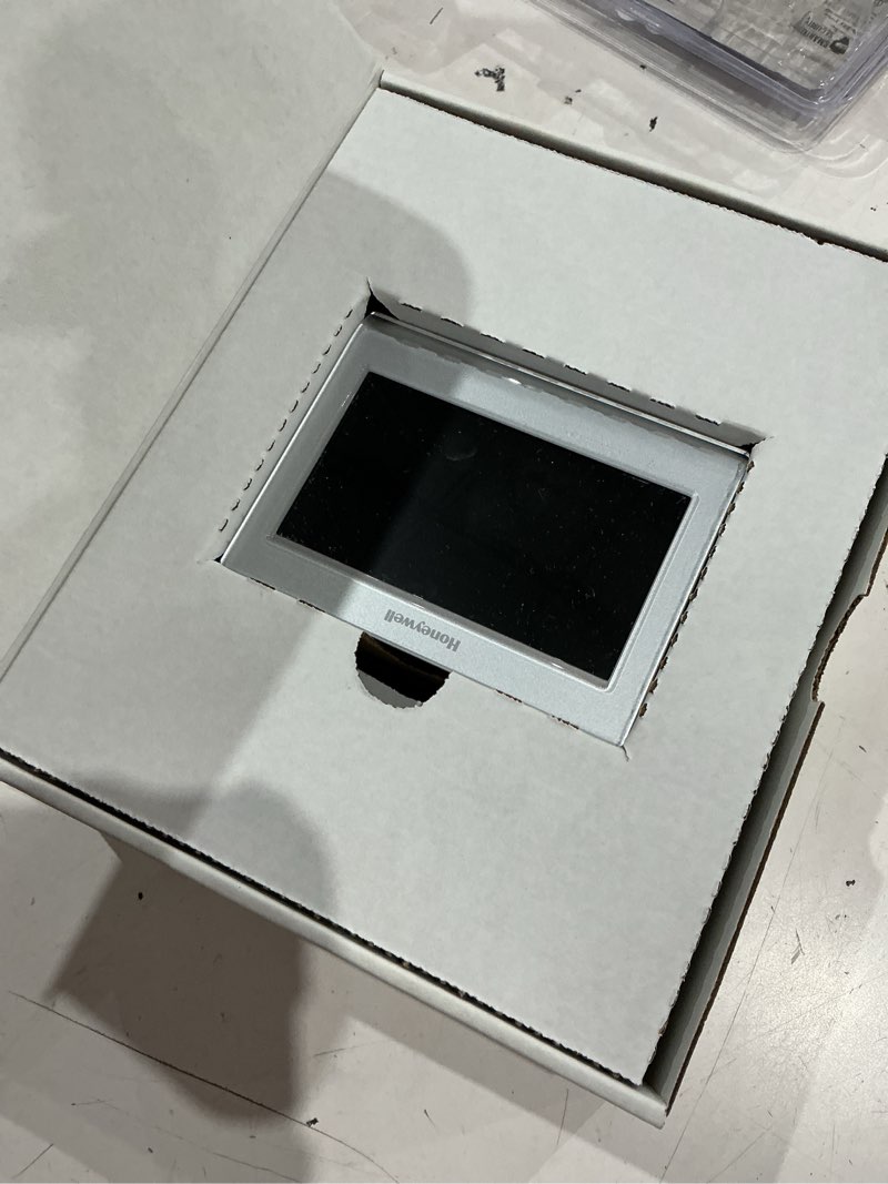 Condition photo showing As Is for honeywell home smart color built in wifi heating and cooling touch screen programmable thermostat
