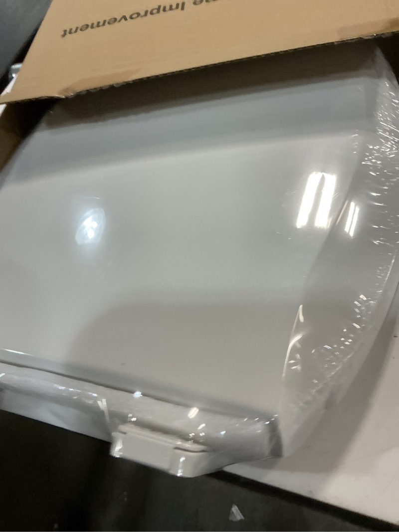 Condition photo showing New/Like New for aünsffer family toilet seat elongated, built-in toddler potty training seat, baby toilet lid 2 in 1 soft close quiet with magnet, easy clean pp material safe and no loosen (white elongated 18.5 inch) white elongated 18.5inch with baby seat