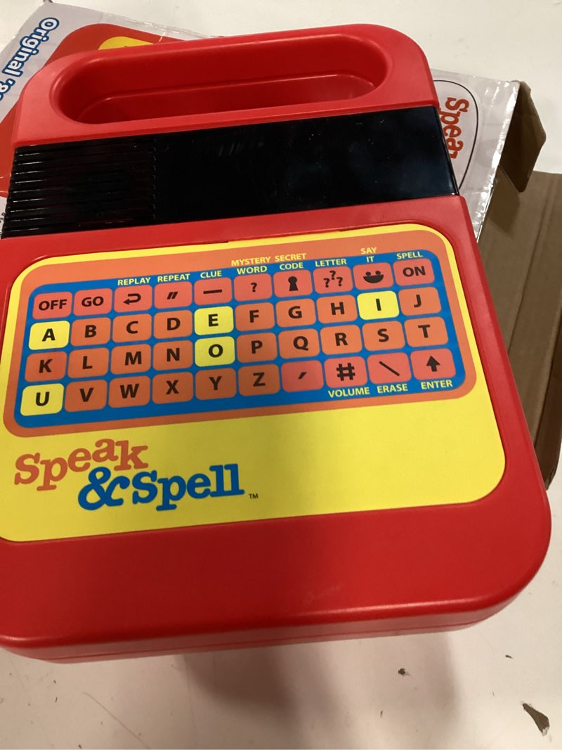 Condition photo showing New/Like New for speak & spell electronic game - educational learning toy, spelling games, 80s retro handheld arcade, autism toys, activity for boys, girls, toddler, ages 7+