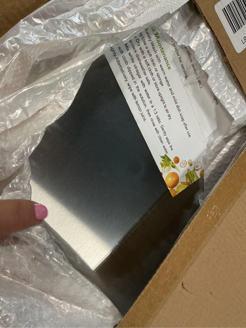 Condition photo showing Good Condition for titanium cutting board, 100% pure titanium cutting boards for kitchen, cutting boards non toxic for separating raw meat, vegetables and fruits, dishwasher safe & knife friendly(18"l x 12"w)