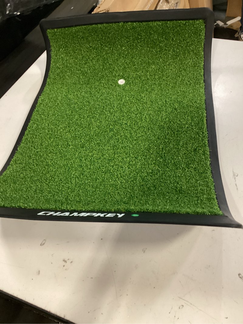 Condition photo showing Good Condition for champkey premium synthetic turf golf hitting mat | heavy duty rubber base golf practice mat | come with 1 rubber tee and 9 plastic tees s (8.5" x 17") lite version