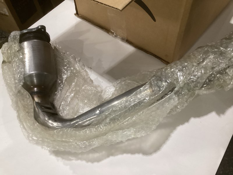 Condition photo showing As Is for high flow front catalytic converter kit direct-fit chevy & gmc models - captiva sport 2012-2015 equinox 2010-2017 terrain 2010-2017 - l4 2.4l/679-544