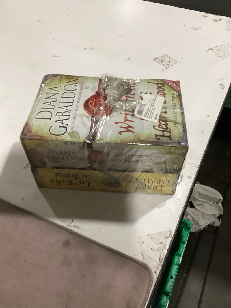 Condition photo showing New/Like New for outlander series 2 books set by diana gabaldon (an echo in the bone, written in my own heart's blood)