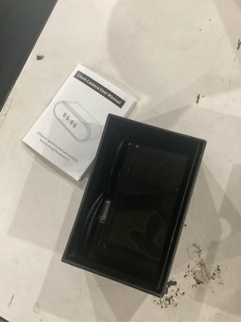 Condition photo showing Good Condition for wireless wifi security camera, nanny cam for home, indoor camera with clock with app control, ai motion detection, loop recording, night vision, local & cloud storage, easy to use black