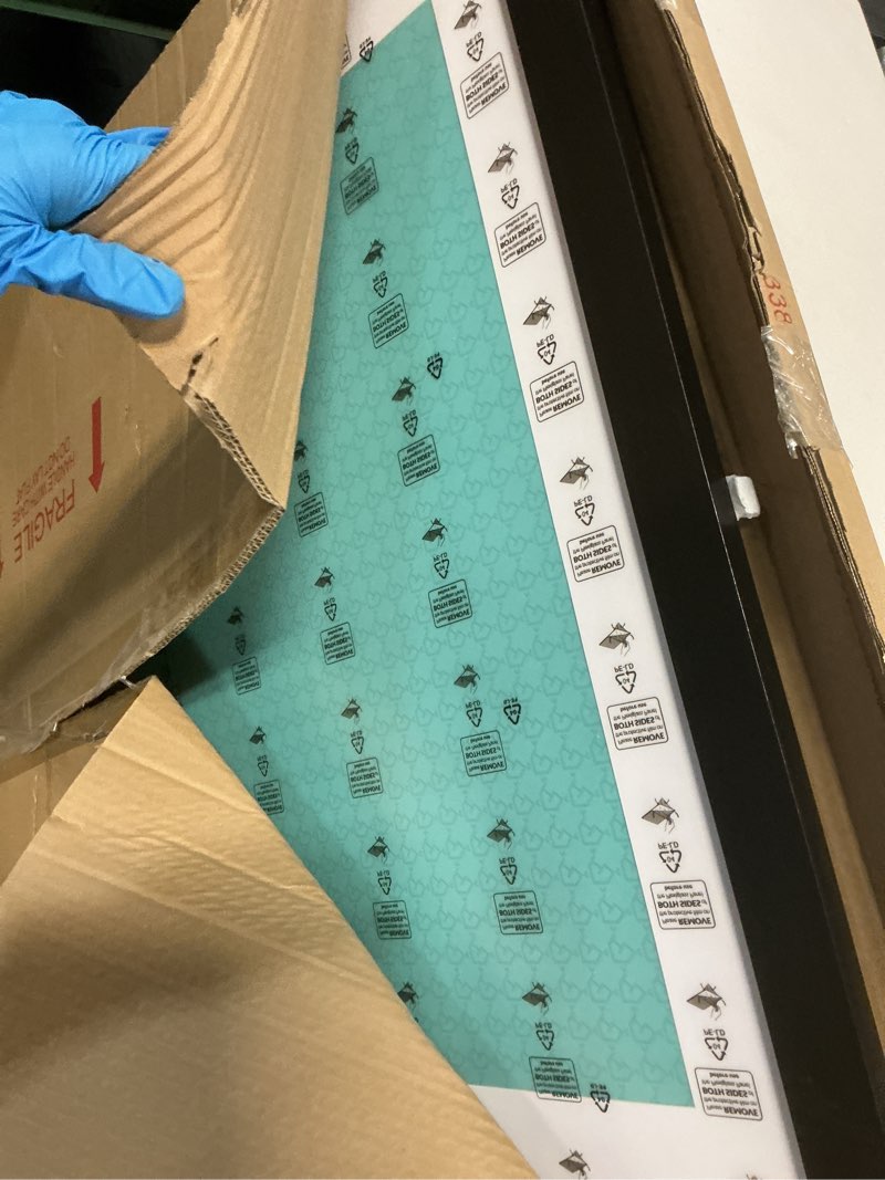 Condition photo showing Good Condition for LaVie Home 30x40 Poster Frame Black, Display Pictures 24x36 with Mat or 30x40 Without Mat, Stable and Sturdy Picture Frame with Polished Plexiglass, Horizontal and Vertical Format of The Wall?1 Pack? 30x40 Black