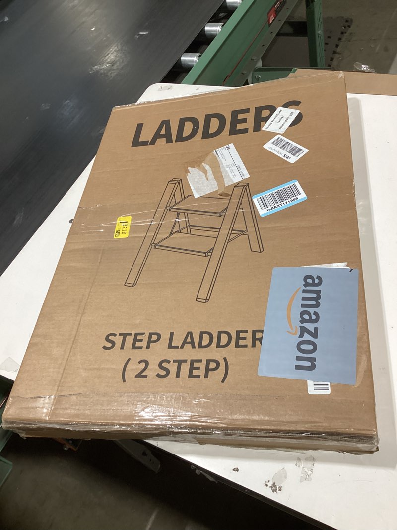 Condition photo showing New/Like New for taranta 2-step aluminum ladder,lightweight folding step stool with extra-wide anti-slip steps,330 lbs capacity,compact space-saving design for home,kitchen and black&woodgrain 2 step