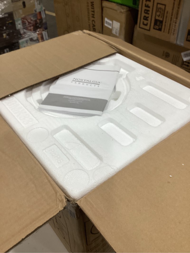 Condition photo showing New/Like New for nostalgia retro compact countertop microwave oven - 0.7 cu. ft. - 700-watts with led digital display - child lock - easy clean interior - ivory retro classic 0.7 cu. ft. ivory