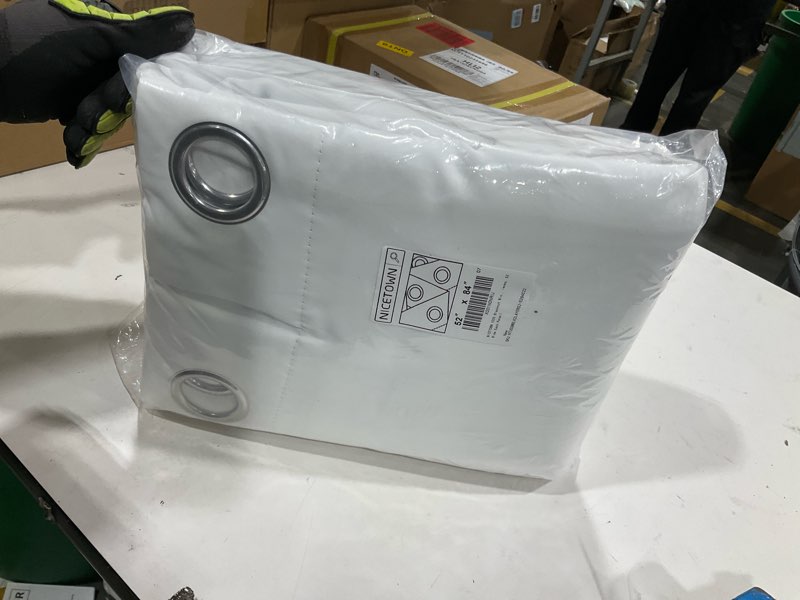 Condition photo showing New/Like New for NICETOWN 100% Blackout Window Curtain Panels, Cold and Full Light Blocking Drapes with Black Liner for Nursery, 84 inches Drop Thermal Insulated Draperies (White, 2 Pieces, 52 Wide Each Panel) Pure White 52\\\"W x 84\\\"L (Pack of 2)