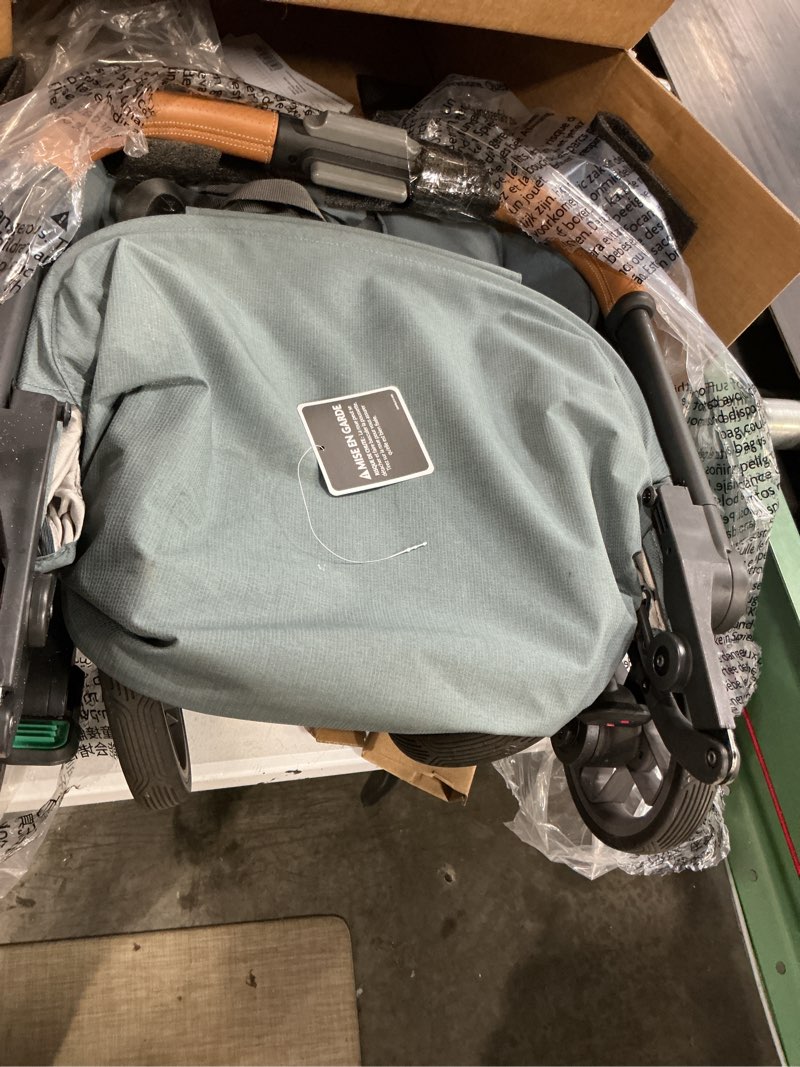 Condition photo showing As Is for uppababy minu v3 travel stroller | lightweight + compact design | one-hand fold + unfold | from birth + overhead compatible | dillan (stone blue/carbon frame/sand leather)