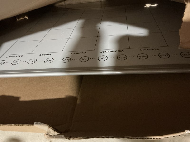 Condition photo showing As Is for Amazon Basics 24" x 36" Monthly Whiteboard Calendar with Cork Board, Wall Mounted, Easy to Install, Silver Aluminum Frame