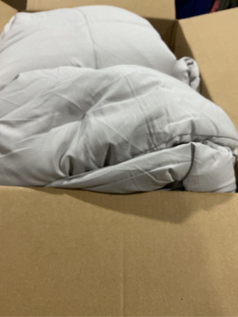 Condition photo showing As Is for Grey comforter