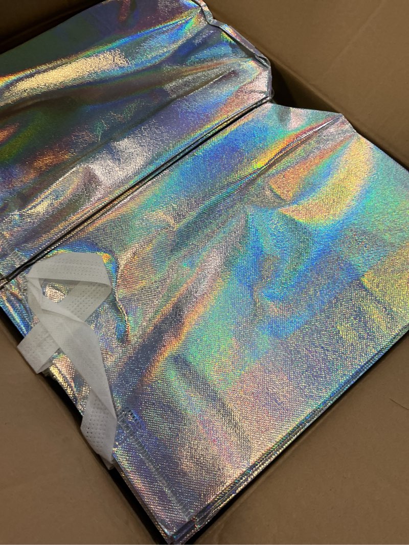 Condition photo showing New/Like New for 100 pcs iridescent glossy gift bags medium size, 8x4x10 in holographic reusable gift bags with handles & sturdy base, ideal for birthday, wedding, bachelorette, party favors, holiday goodie bag iridescent 1 count (pack of 100)