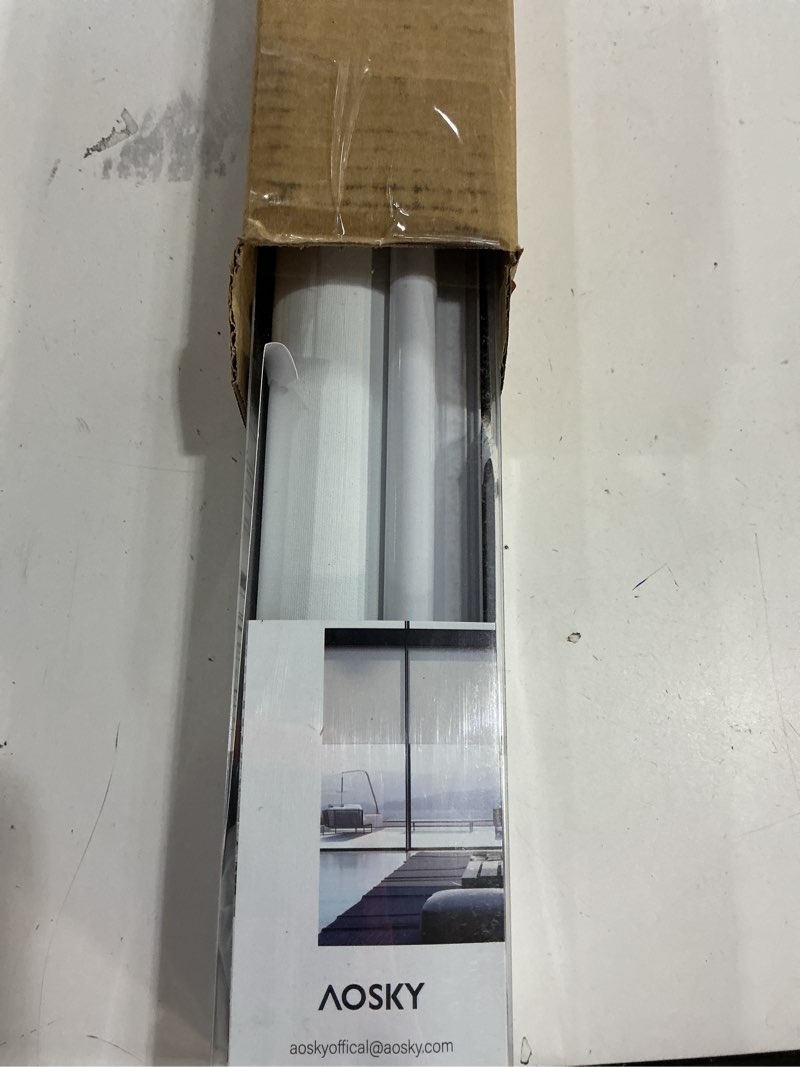 Condition photo showing New/Like New for AOSKY Cordless Roller Shades Blackout Blinds for Windows Room Darkening Rolled Up Shades with Spring System, UV Protection Window Shades Door Blinds for Home and Office (35" W x 72" H, Ivory) 35"W x 72"H Ivory