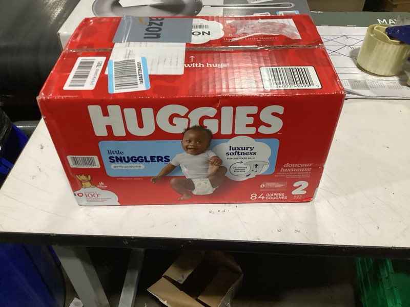 Condition photo showing New/Like New for huggies size 2 diapers, little snugglers baby diapers, size 2 (12-18 lbs), 84 count, packaging may vary size 2 84
