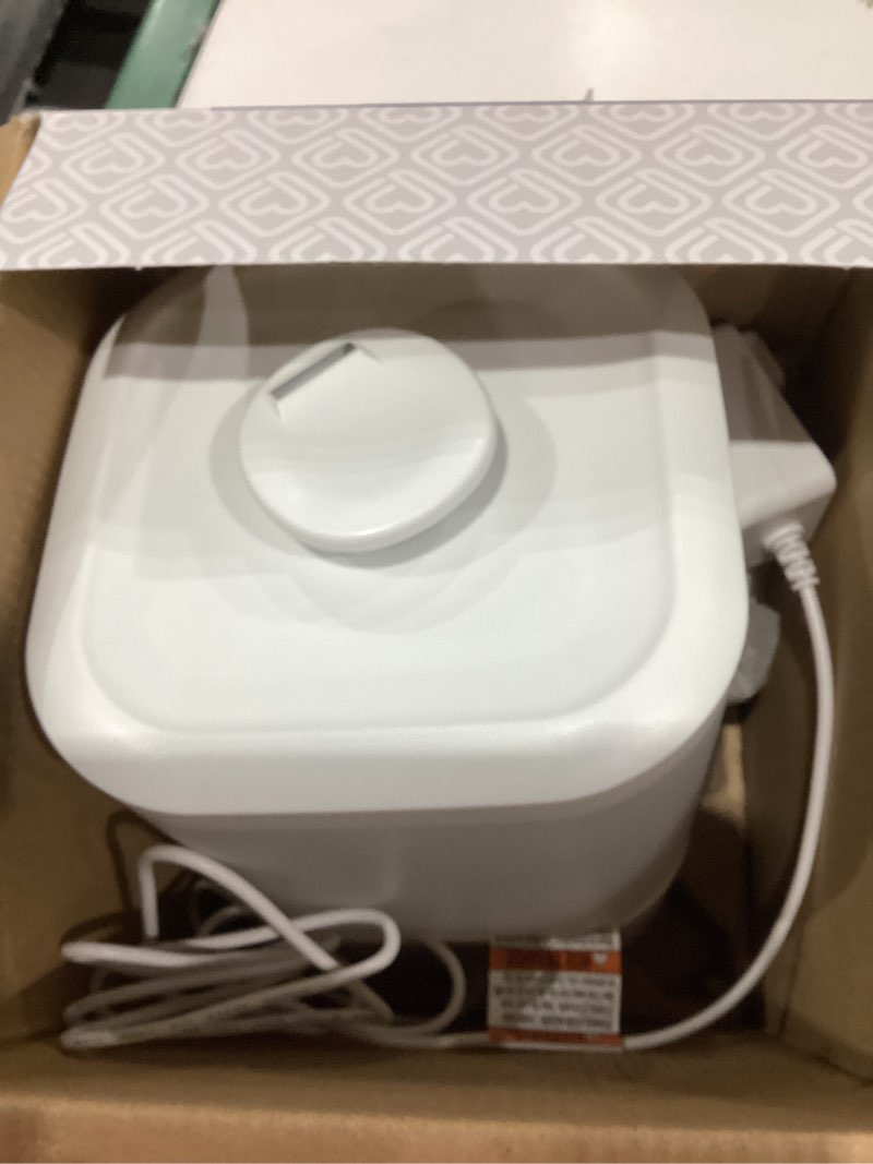 Condition photo showing As Is for safety 1st easy-fill cool mist humidifier, white