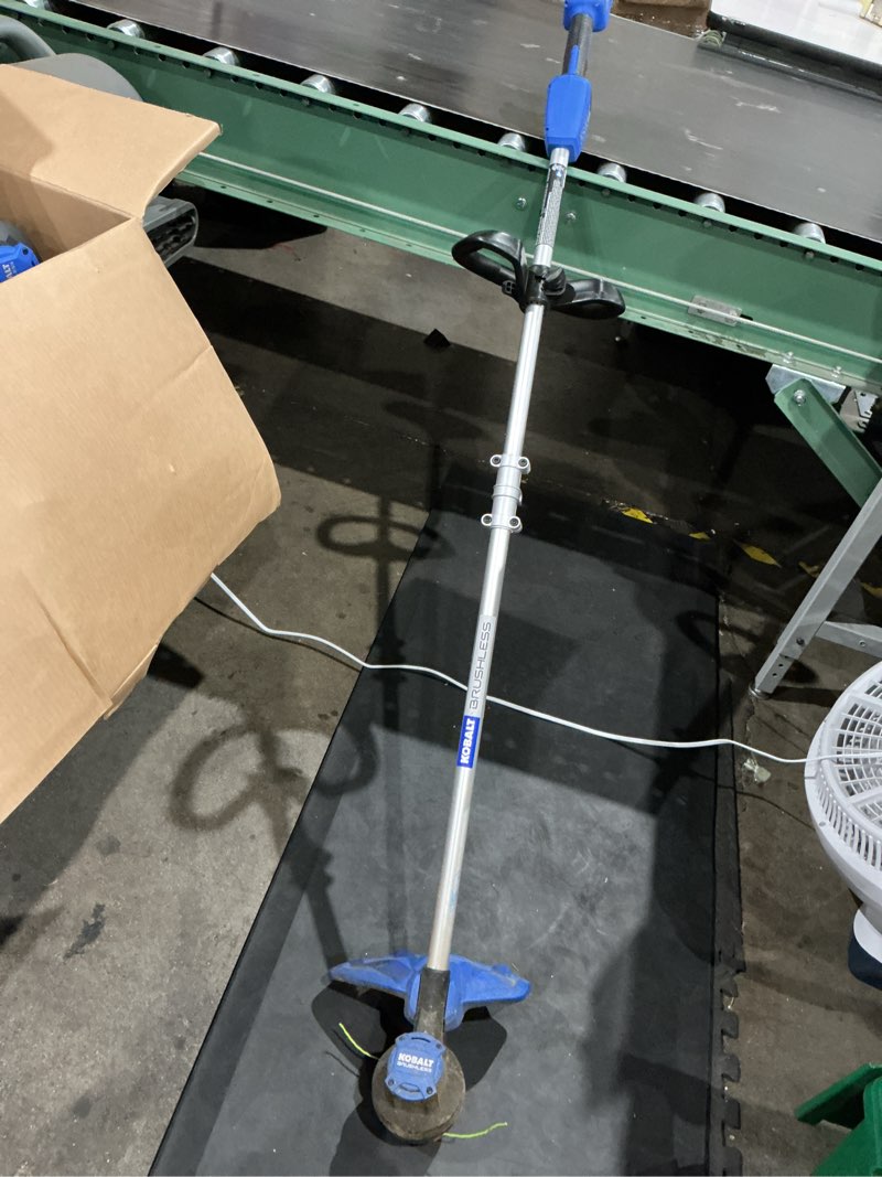 Condition photo showing As Is for kobalt 24-volt 15-in straight shaft battery string trimmer
