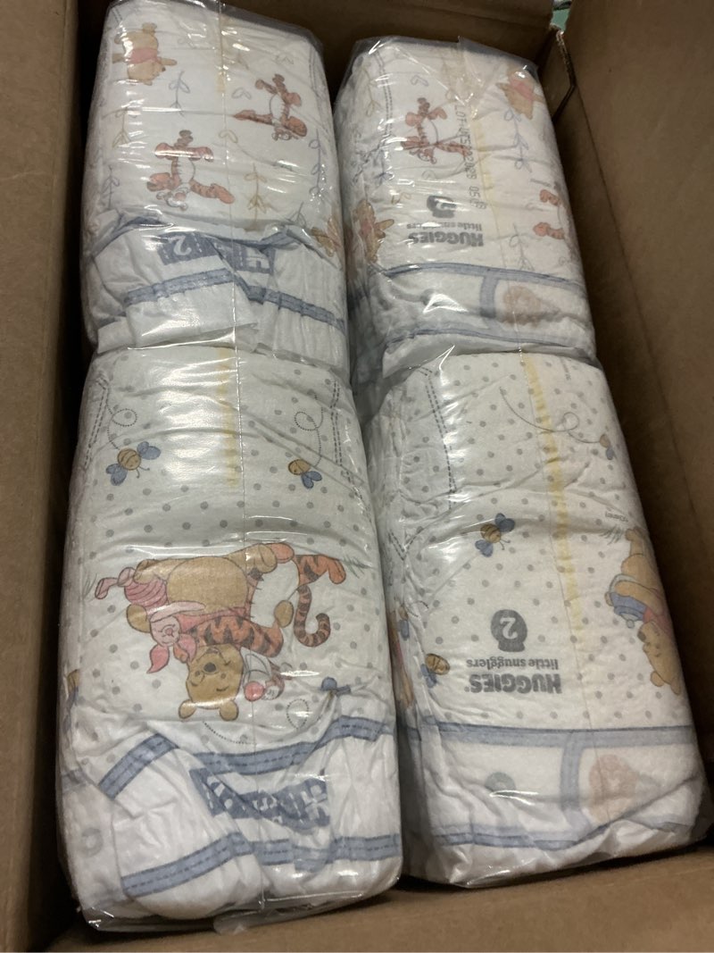 Condition photo showing Good Condition for huggies size 2 diapers, little snugglers baby diapers, size 2 (12-18 lbs), 84 count, packaging may vary size 2 84