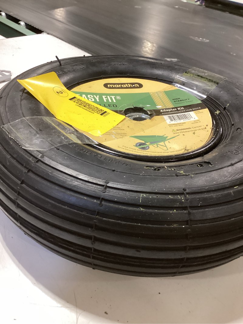 Condition photo showing As Is for 13 in. pneumatic universal wheelbarrow wheels