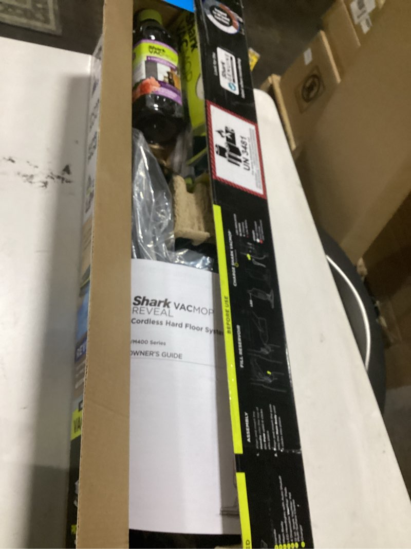 Condition photo showing Good Condition for shark vacmop reveal new cordless hard floor cleaner, vacuum & spray mop, powerful suction, lightweight, illumination light, includes 4 disposable pads, 12oz pet multi-surface cleaning solution, vm401