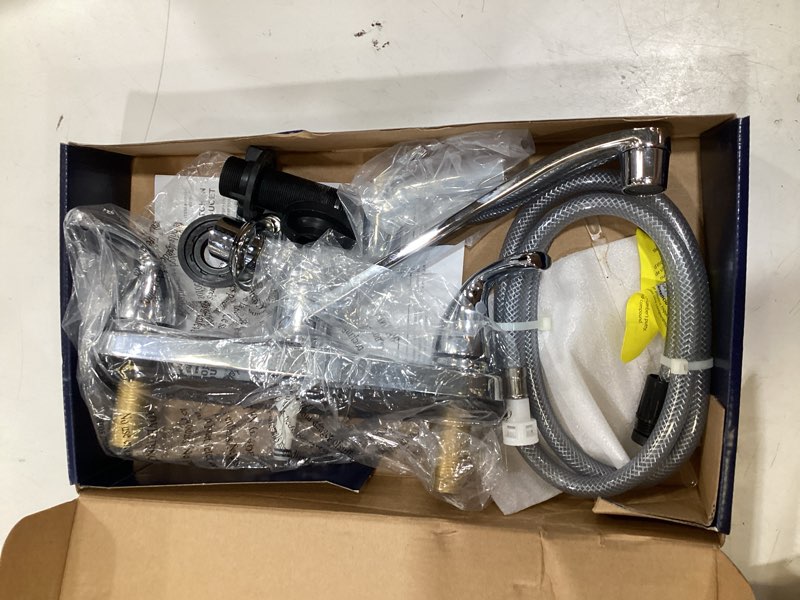 Condition photo showing As Is for project source dover chrome double handle deck-mount kitchen faucet (includes deck plate) (includes side sprayer)