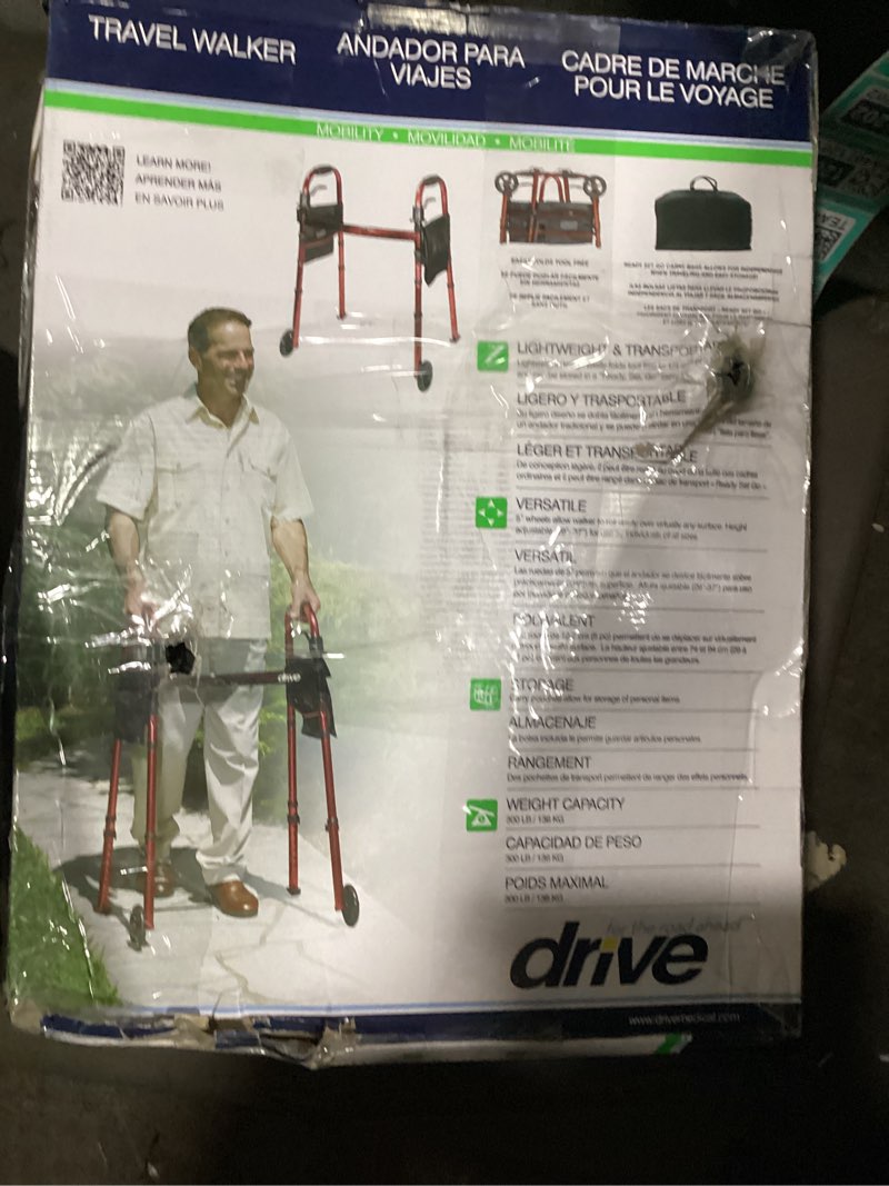 Condition photo showing As Is for Drive Medical Deluxe Portable Folding Travel Walker with 5" Wheels and Fold up Legs, Red