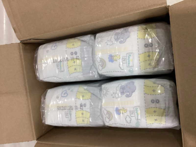 Condition photo showing As Is for pampers swaddlers diapers newborn - size 0, 84 count, ultra soft disposable baby diapers