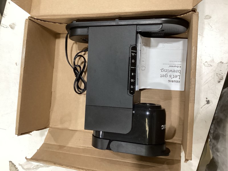 Condition photo showing As Is for keurig k-express single serve k-cup pod coffee maker, 3 brew sizes, strong button feature, 42oz removable reservoir, black