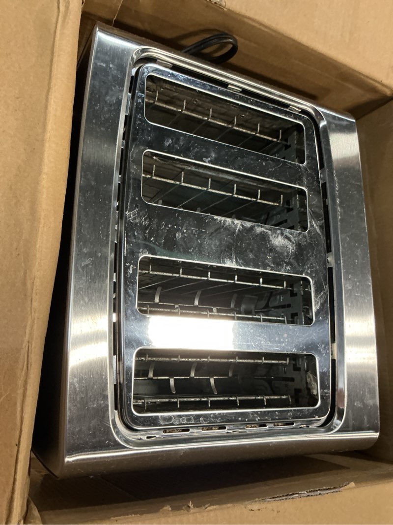 Condition photo showing As Is for black+decker 4-slice toaster, stainless steel, tr4900ssd