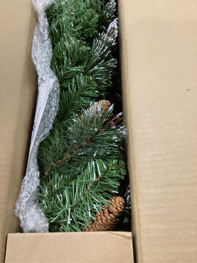Condition photo showing Good Condition for national tree company 9 ft pre-lit crestwood spruce artificial christmas garland, christmas decoration with glitter, pinecones, red berries, 50 warm white led lights, 180 tips, timer, green battery operated tree