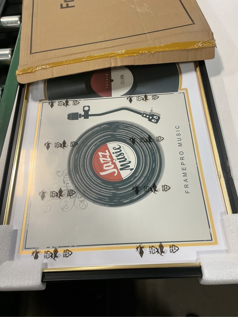 Condition photo showing New/Like New for Record Frame with 2 Double Sided Mats (White over Gold), Jukebox Record Album Frames for 12x12 LP Covers, Vinyl Record Display Wall Mounting, Home Decor, Black Picture Frame with Gold Trim 1 16x23.5 White over Gold Mat