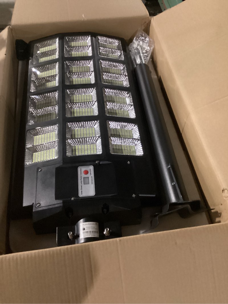 Condition photo showing As Is for okpro 8000w solar street light outdoor, ip66 waterproof solar lights outdoor with motion sensor & remote, dusk to dawn commercial security lighting for parking lot, yard, farm, driveway 8000 1