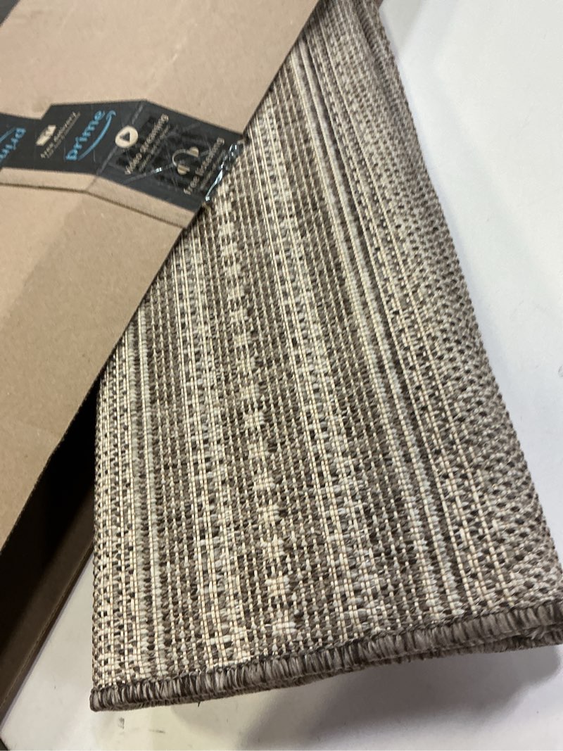 Condition photo showing As Is for dexi dirt trapper door mat, 31x48 washable doormat, dirt resistant and absorbent, easy clean low-profile floor rugs for entryway, front door, and inside entrance, striped grey 2'7" x 4' (rectangular) striped grey