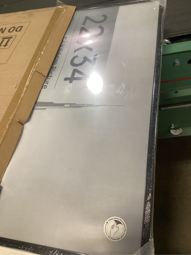 Condition photo showing As Is for boarding 22.375x34 poster frame 4 pack, scratch-proof picture frames for wall gallery, slide-in strips,photo frame 22.375 by 34 for horizontal or vertical wall display, black black 22.375x34