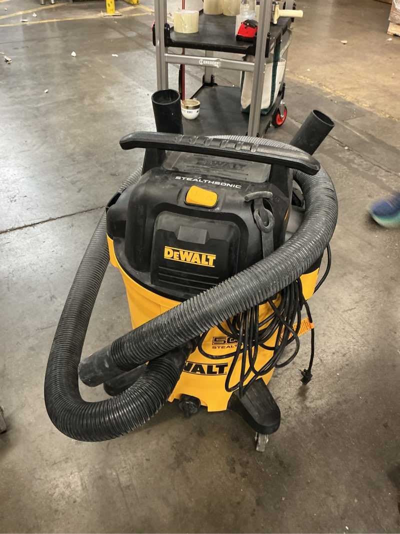 Condition photo showing As Is for dewalt stealthsonic quiet 12-gallon 5.5 hp corded wet/dry shop vacuum