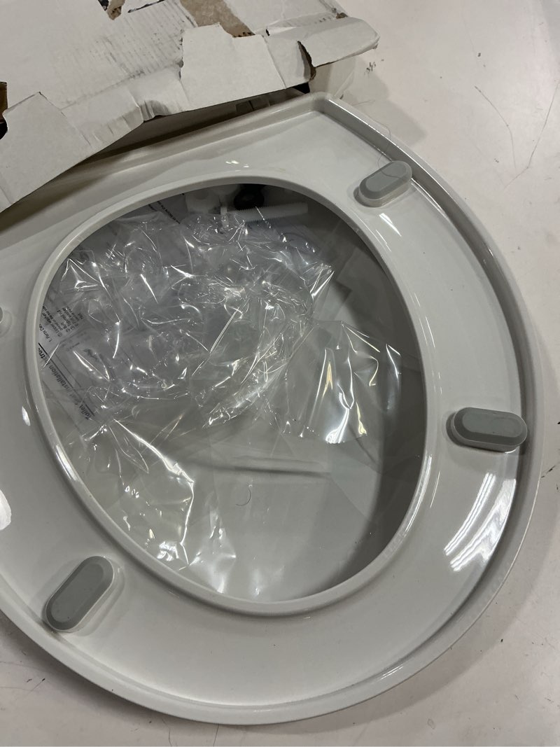 Condition photo showing As Is for round toilet seat, standard 16.5” slow/soft close round toilet seat for round toilets, no-slam quiet-close lid, easy-to-install, white, durable never-loosen design white round(standard)