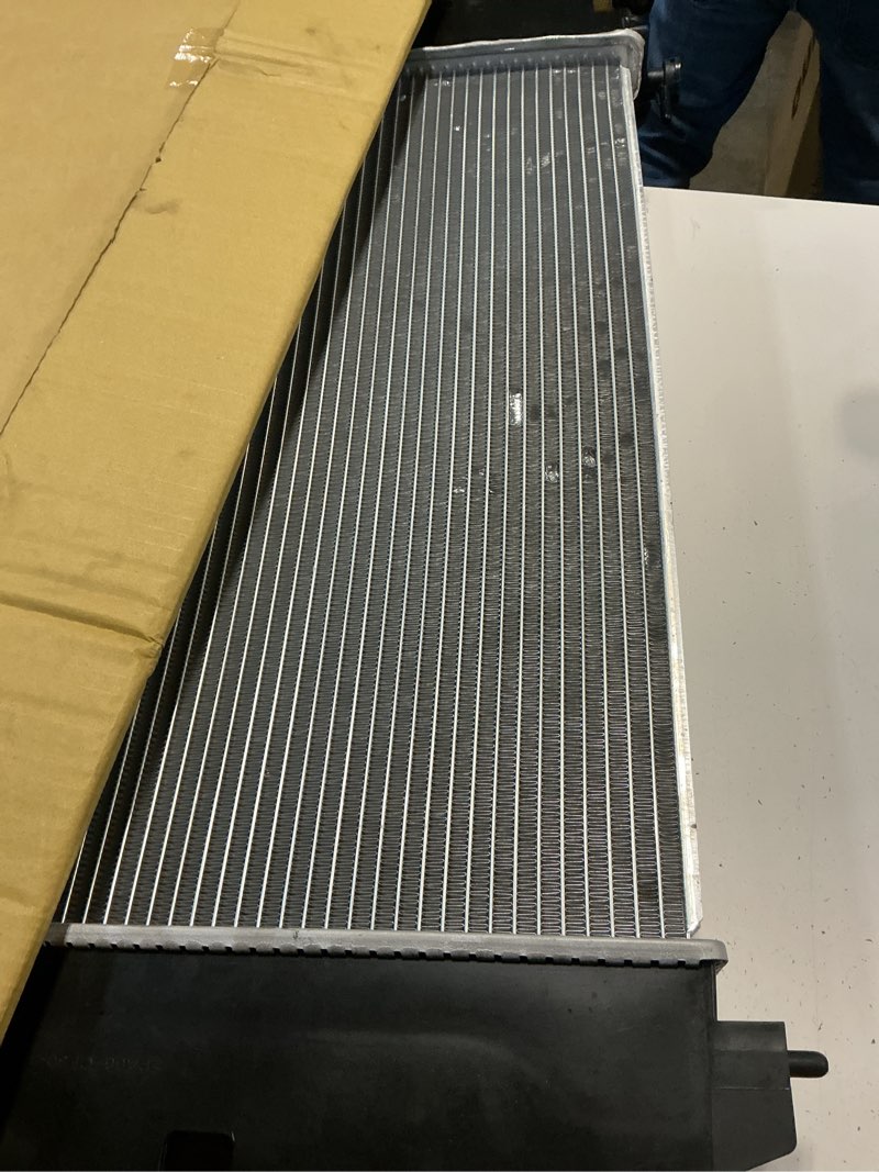 Condition photo showing As Is for engine coolant radiator assembly with transmission oil cooler, fit for toyota corolla, matrix, pontiac vibe 2003-2008, l4 1.8l, oe 2428, 2432, cu2428, 8012428, 164000d230 oe: 2428, cu2428, 8012428