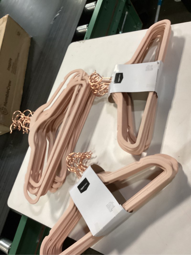 Condition photo showing Good Condition for SONGMICS Velvet Hangers, Set of 45 Clothes Hanger with Rose Gold Swivel Hook, Non-Slip, and Space-Saving, 0.2-Inch Thick, 17.1-Inch Long for Coat, Shirt, Dress, Pants, Tie, Coral Pink UCRF21PK50
