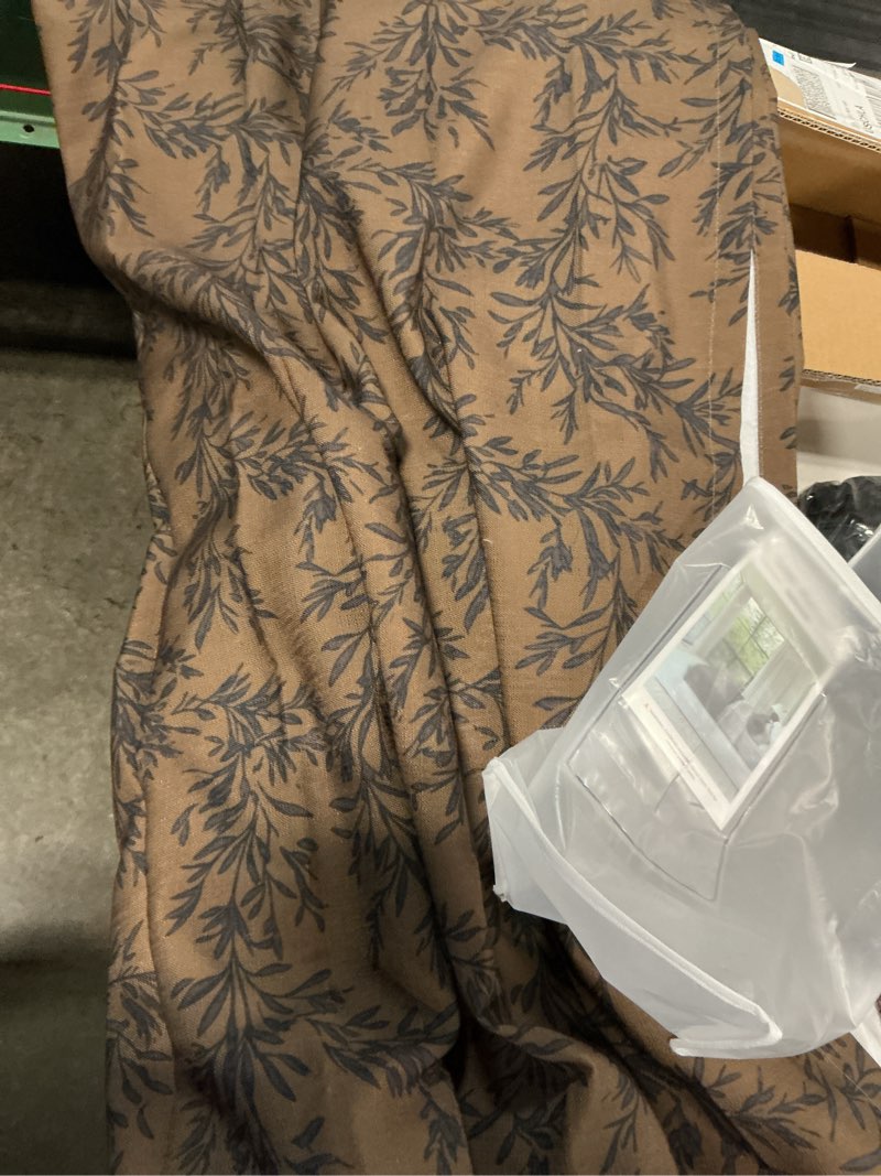 Condition photo showing Good Condition for twopages blackout curtain panel brown with floral pattern 38”x92” (1 panel only)