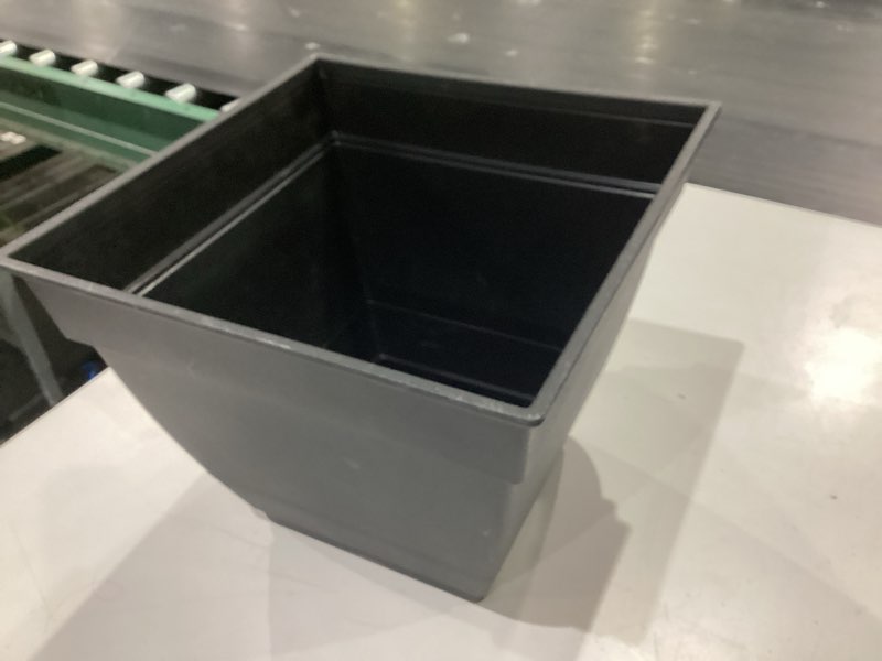 Condition photo showing As Is for (damaged)style selections square 13.11-in w x 10.71-in h black recycled plastic indoor/outdoor planter