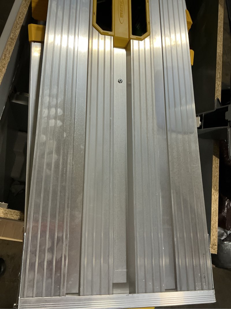 Condition photo showing As Is for werner aluminum work platform 300lb load capacity 